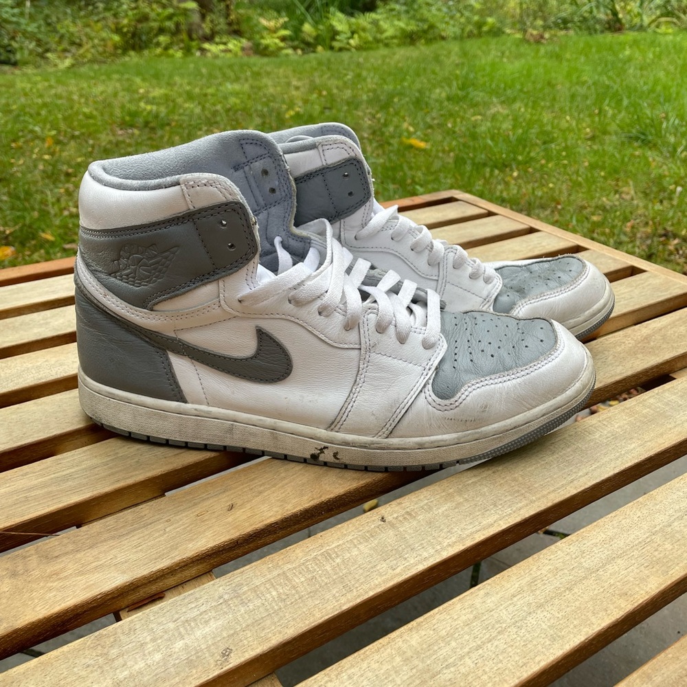 Size 11.5 men’s gray and white Air Jordan Mids
